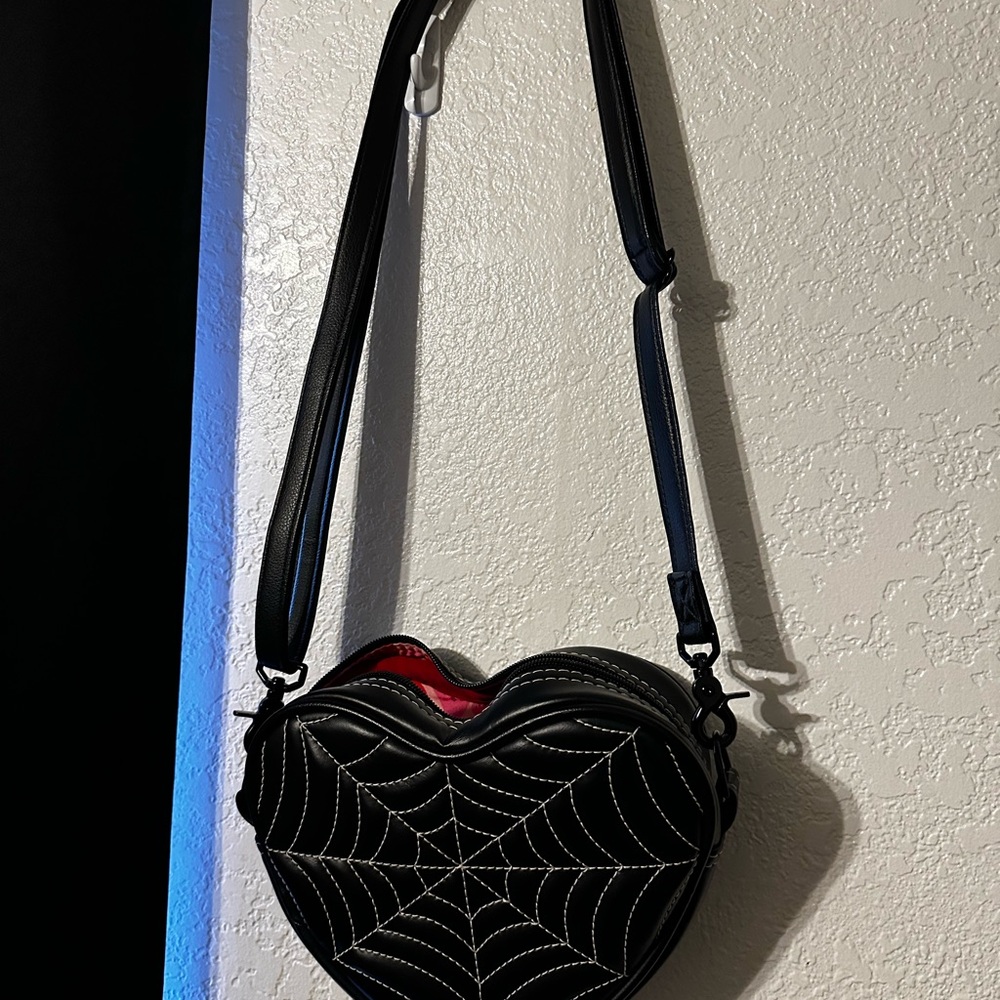 Black Heart-Shaped Crossbody Bag with White Web Stitching